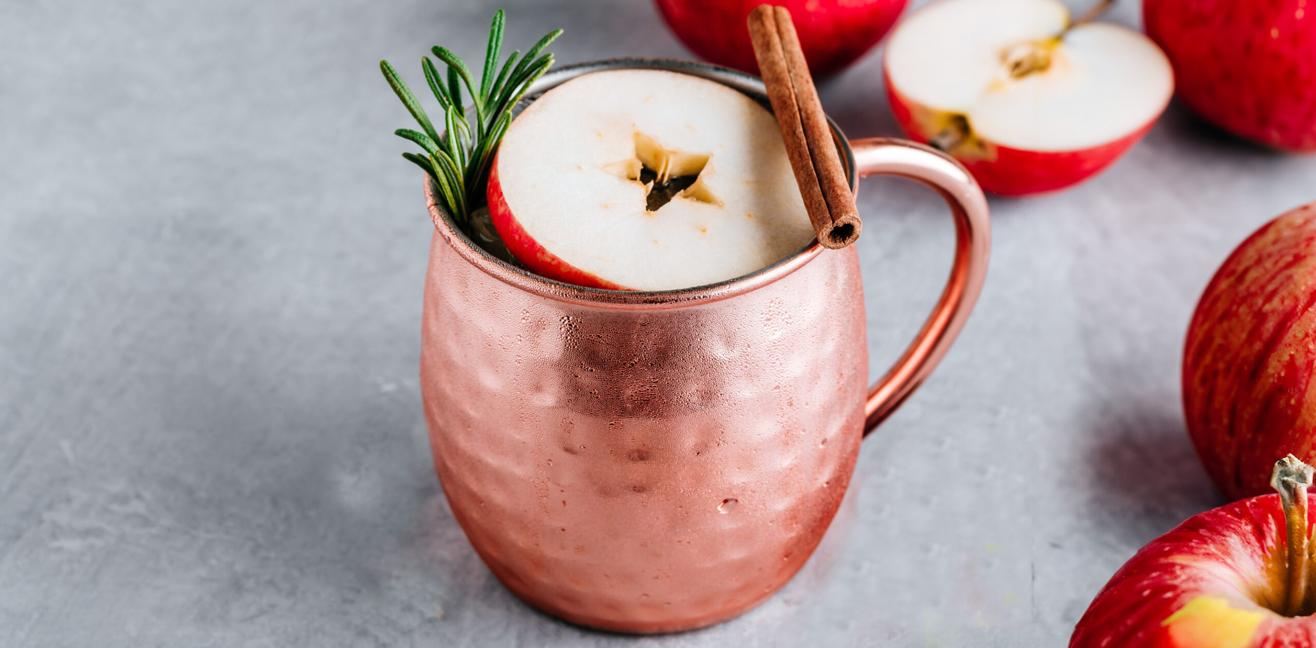 Apple pie moonshine mule cocktail in copper mug festive cocktail